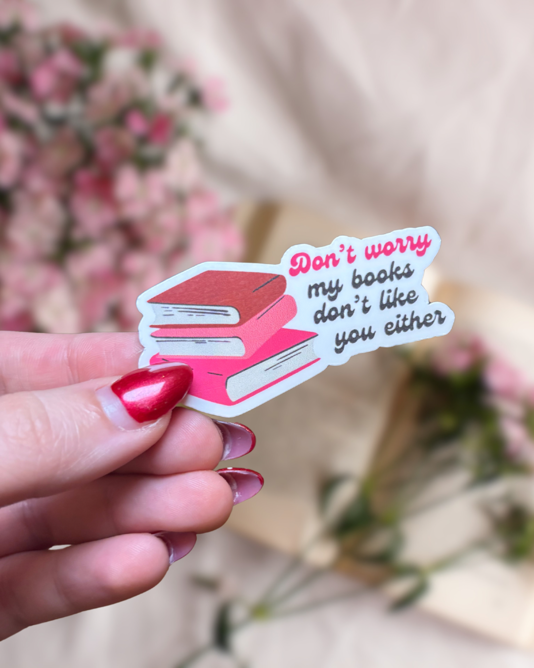 Don't worry my books don't like you either sticker